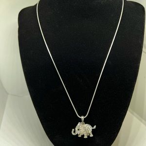 Elephant charm necklace.